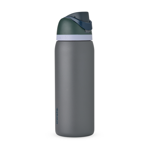 FreeSip 32oz in Off the Grid, charcoal grey body with dark forest green flip cap, navy blue carry loop, and pale lavender accent band