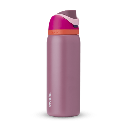 FreeSip 32oz in Crown Jewel, dusty mauve body with hot pink flip cap, light pink carry loop, and bright orange accent band