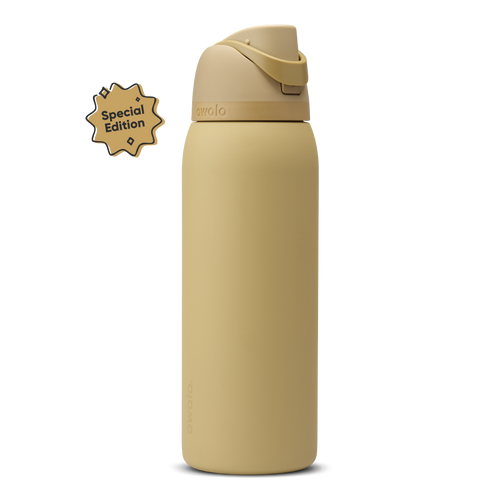 FreeSip 40oz Autumn Vista; warm golden sand body with matching tan flip cap, lighter cream-tan carry loop, and tan lid